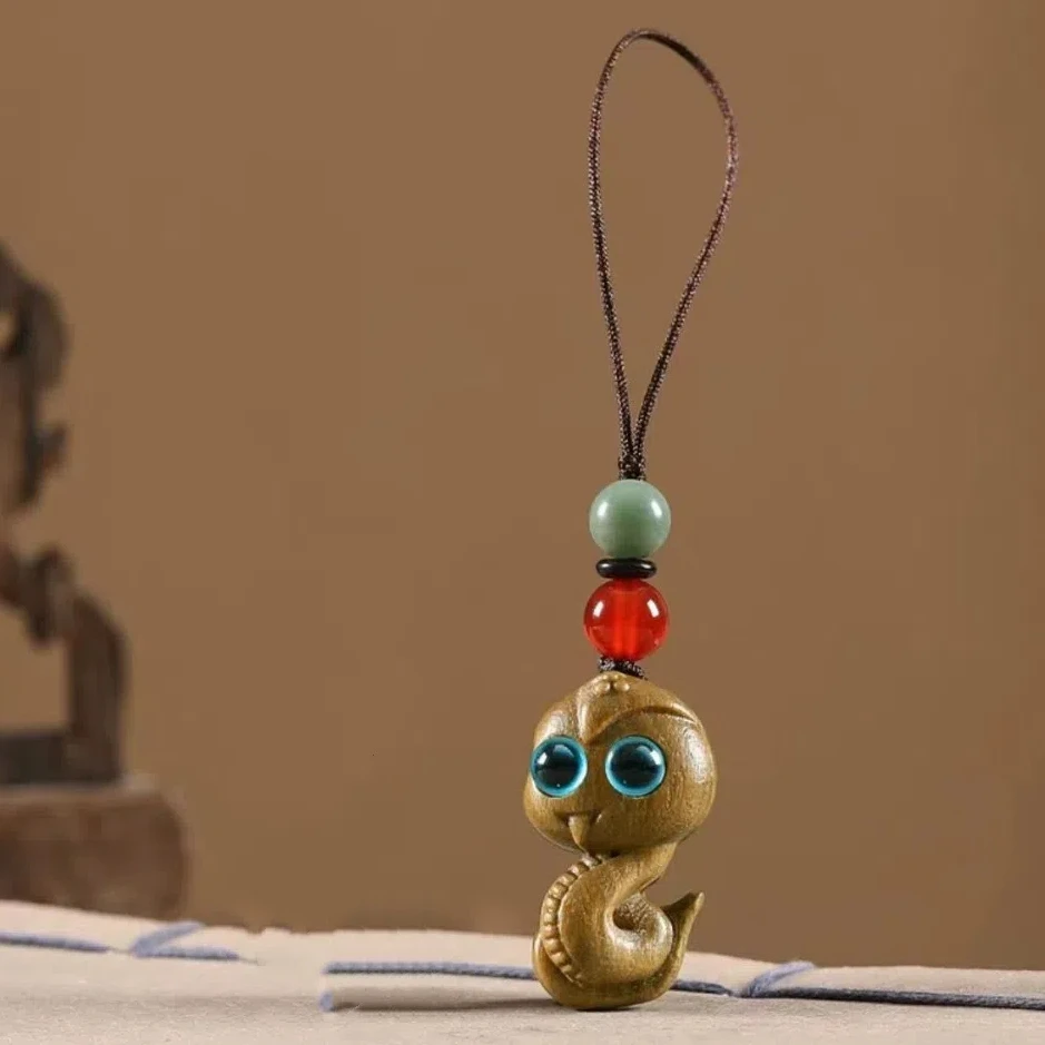 Mini Zodiac Snake Keychain Cyan Eyes Waterproof New Year Carved Pendant Auspicious Weaving Rope
Mini Zodiac Snake Keychain Cyan Eyes Waterproof New Year Carved Pendant Auspicious Weaving Rope