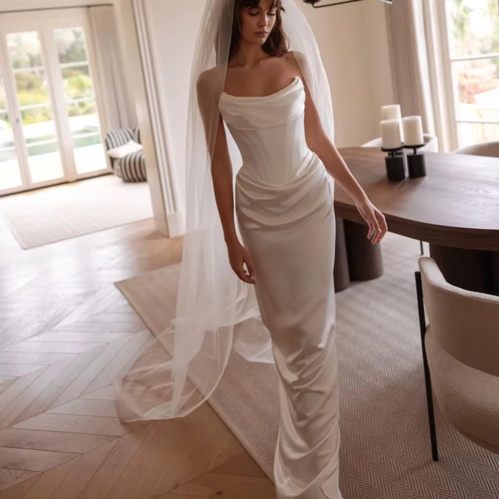 Customized Pleated Satin Sheath Long Wedding Dress Elegant Classic Strapless Bridal Gown Dreamy Sleeveless Dresses Bridal Gown
Customized Pleated Satin Sheath Long Wedding Dress Elegant Classic Strapless Bridal Gown Dreamy Sleeveless Dresses Bridal Gown
