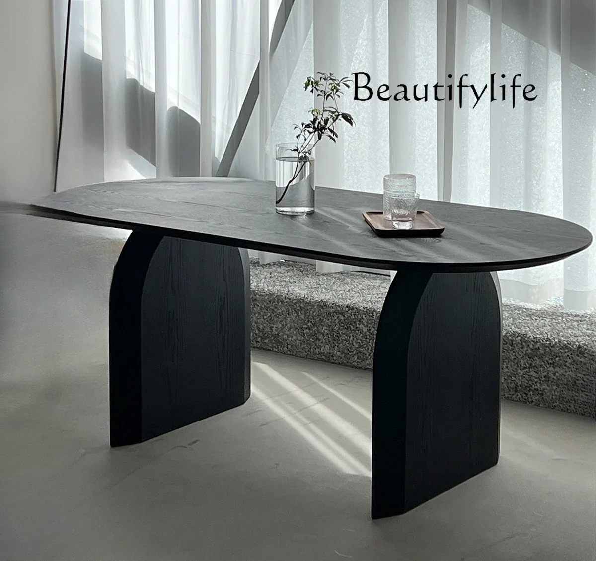 Wabi Sand wind solid wood dining table Nordic home black oval minimalist dining table
Wabi Sand wind solid wood dining table Nordic home black oval minimalist dining table