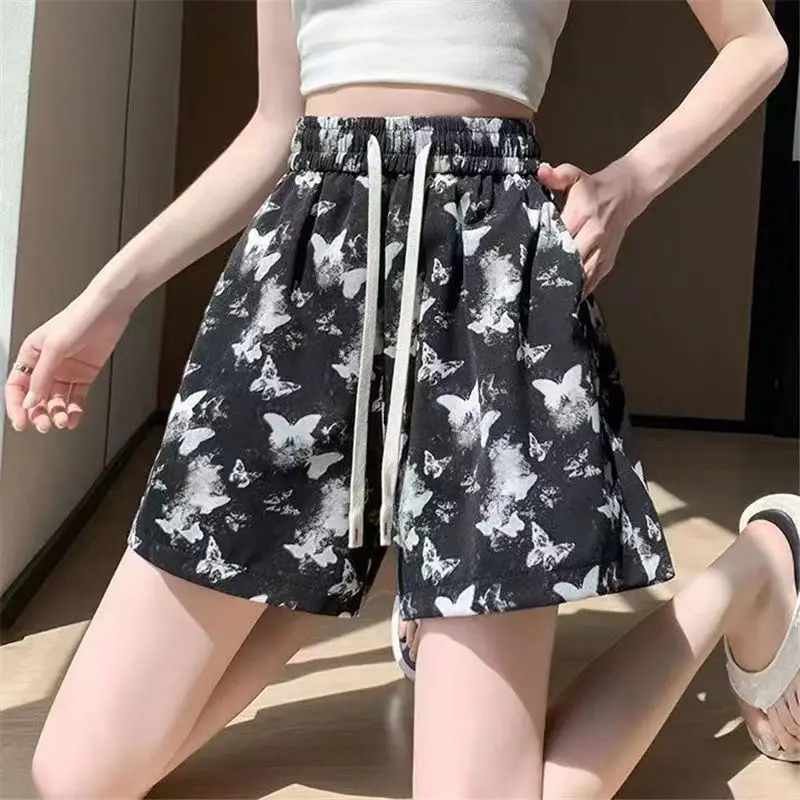 New Womens Ice Silk Wide Leg Quarter Shorts Butterfly Ink Print Drawstring Casual Summer Sportswear Comfortable Outfits
New Womens Ice Silk Wide Leg Quarter Shorts Butterfly Ink Print Drawstring Casual Summer Sportswear Comfortable Outfits