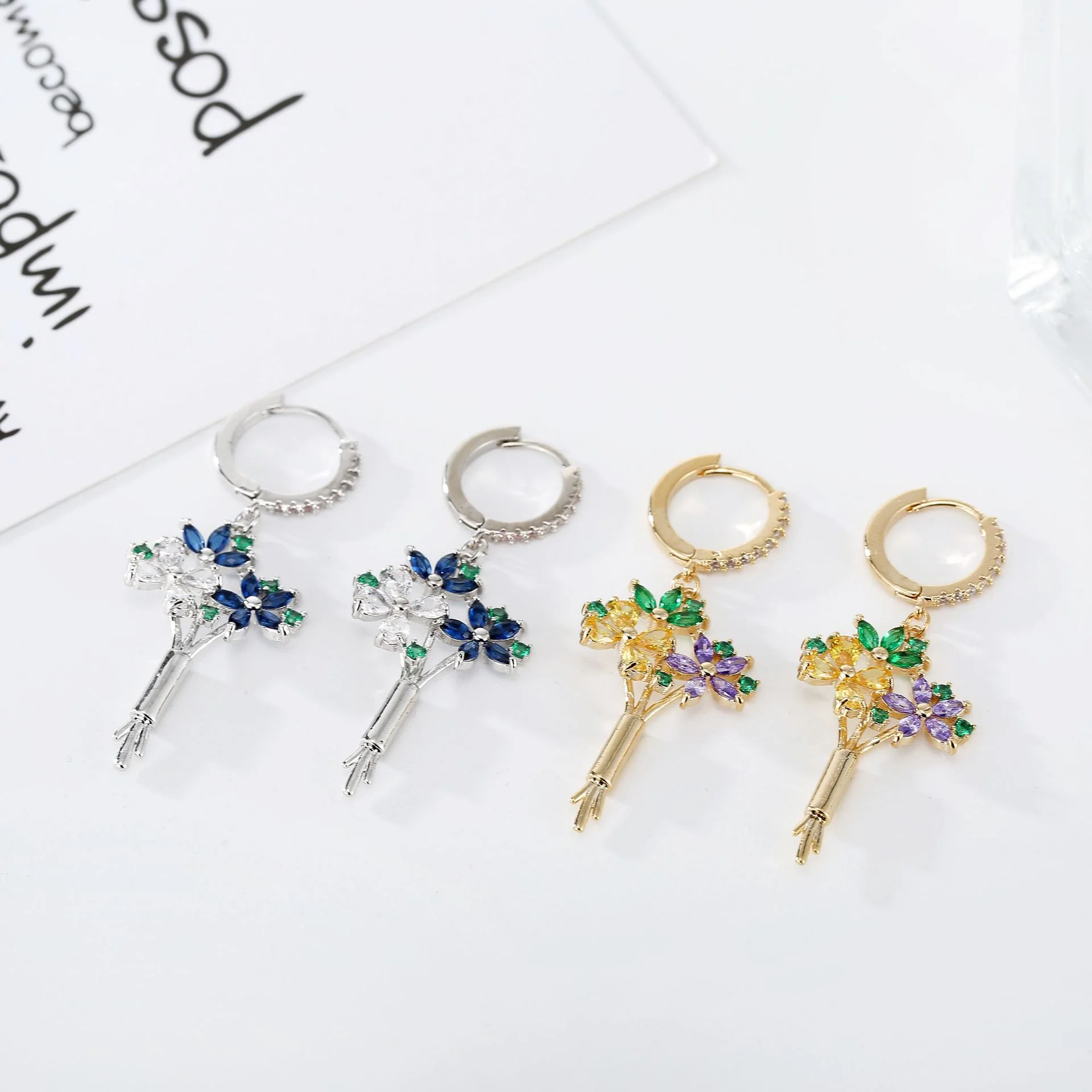Chic Gold-Tone Floral Bouquet Earrings, Paved Multishape Cubic Zircon Dangle Earring, Minimalist Office Accessory for Ladies
Chic Gold-Tone Floral Bouquet Earrings, Paved Multishape Cubic Zircon Dangle Earring, Minimalist Office Accessory for Ladies
