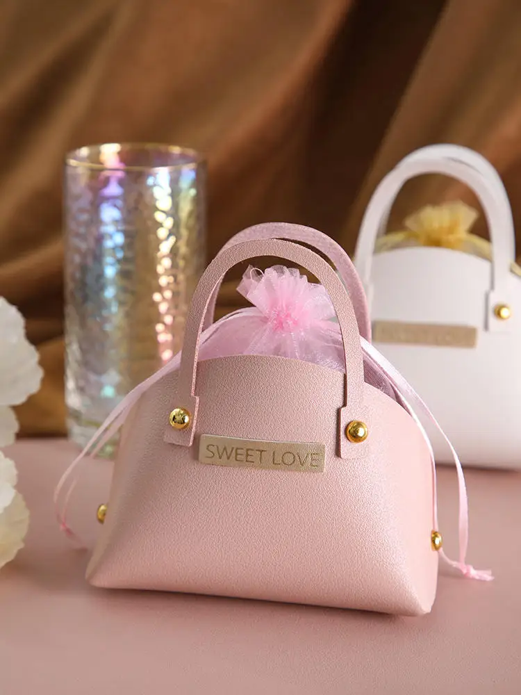 Creative Portable Shell Bag, Candy Box, Handbag, Wedding, Baby Shower Favors, Packaging Gift Boxes, Party Supplies, Wholesale
Creative Portable Shell Bag, Candy Box, Handbag, Wedding, Baby Shower Favors, Packaging Gift Boxes, Party Supplies, Wholesale