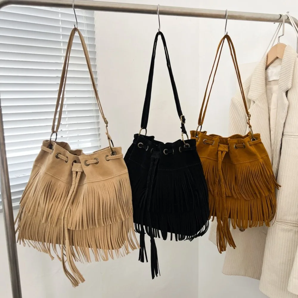 Korean Style Tassel Shoulder Bag PU Leather Solid Color Suede Handbag Bohemian Style Ethnic Style Drawstring Bucket Bag Girls
Korean Style Tassel Shoulder Bag PU Leather Solid Color Suede Handbag Bohemian Style Ethnic Style Drawstring Bucket Bag Girls