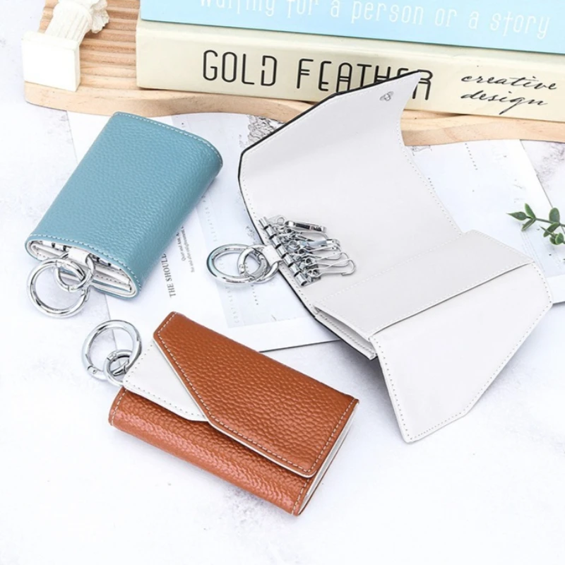 Genuine Leather Key Case for Men & WomenThree Folds Cowhide Small Car Key Chain Cover with Hooks & Fob Organizer
Genuine Leather Key Case for Men & WomenThree Folds Cowhide Small Car Key Chain Cover with Hooks & Fob Organizer