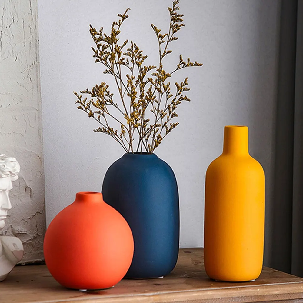 Colorful Ceramic Vase for Flowers Orange Yellow Blue Boho Modern Flower Vase for Bookshelf Centerpiece Table Home Decorations
Colorful Ceramic Vase for Flowers Orange Yellow Blue Boho Modern Flower Vase for Bookshelf Centerpiece Table Home Decorations