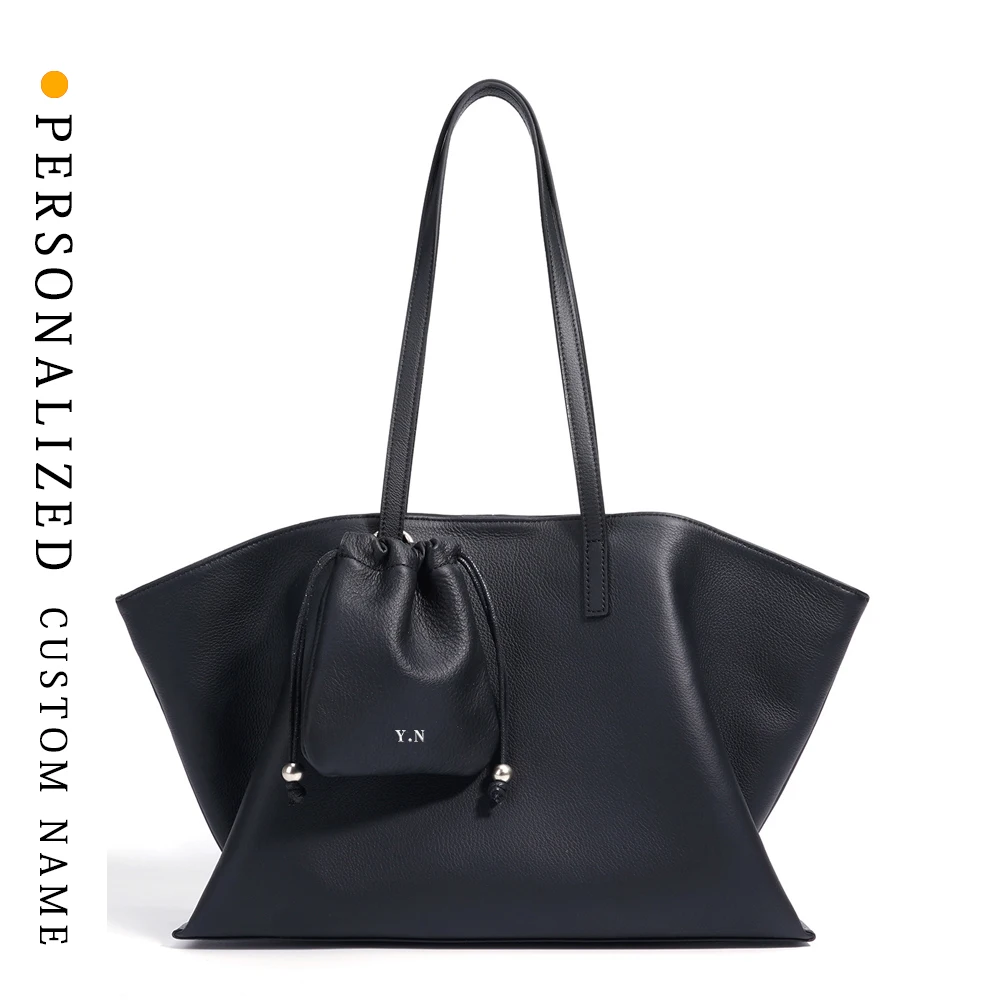 New genuine leather women's bag fashionable large capacity tote bag casual simple one-shoulder carry free gold-plated letters 
New genuine leather women's bag fashionable large capacity tote bag casual simple one-shoulder carry free gold-plated letters