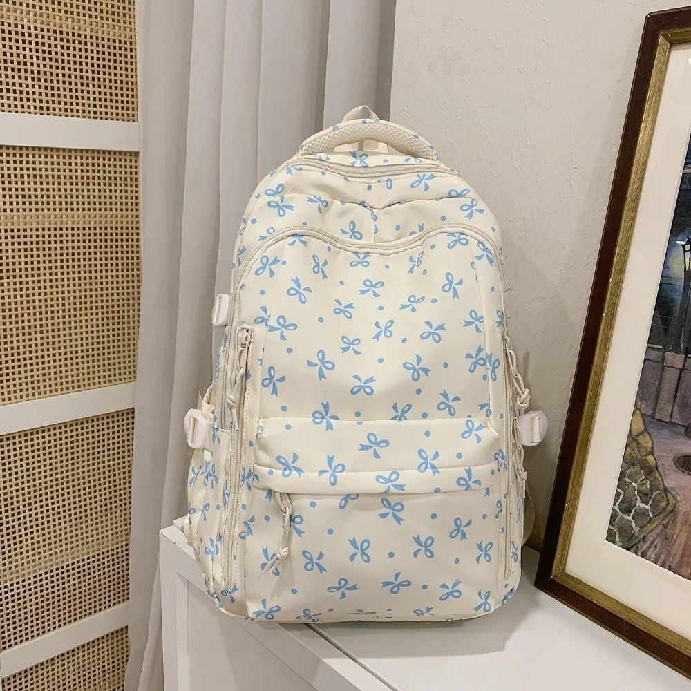 Large Capacity Floral Print Backpack Multi-pocket Multi-compartment Bow Pattern School Bag Thickened Lightweight Rucksack
Large Capacity Floral Print Backpack Multi-pocket Multi-compartment Bow Pattern School Bag Thickened Lightweight Rucksack