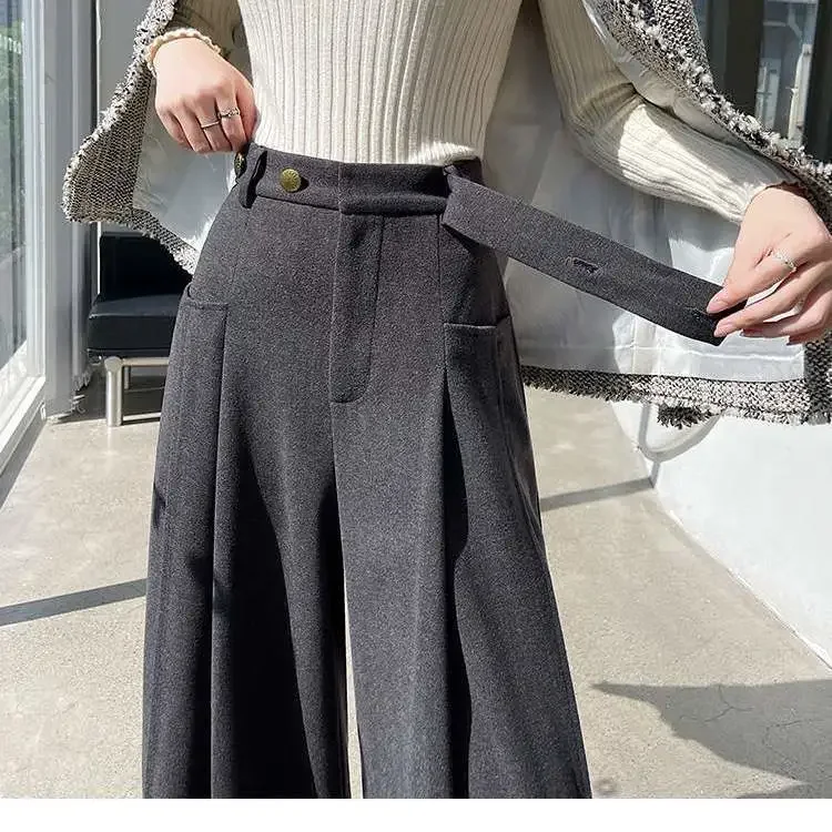 Шерстяные широкие брюки с поясом на пуговицах, осень-зима 2022, корейский новый стиль, утолщенные повседневные брюки-тапочки с высокой талией
Шерстяные широкие брюки с поясом на пуговицах, осень-зима 2022, корейский новый стиль, утолщенные повседневные брюки-тапочки с высокой талией