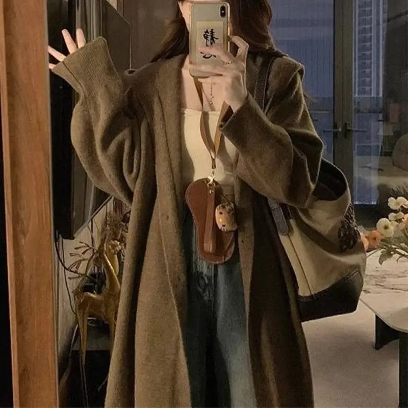 Wear A Long Sweater Cardigan 2025 Autumn and Winter New Lazy Wind Hooded Knitted Sweater Jacket Women
Wear A Long Sweater Cardigan 2025 Autumn and Winter New Lazy Wind Hooded Knitted Sweater Jacket Women