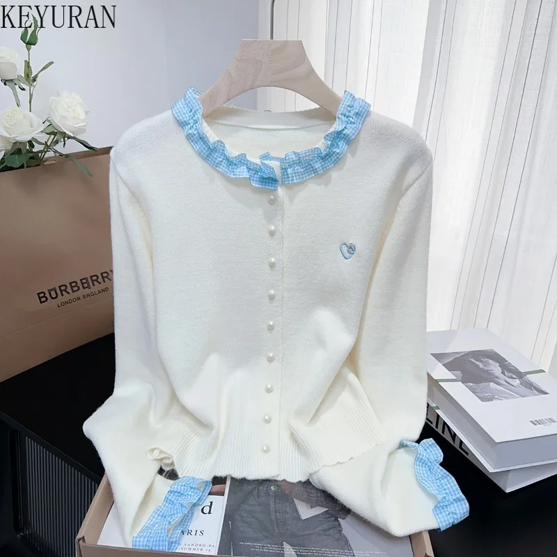 2025 Autumn Winter Ruffes Knitted Cardigan Coat Women Korean Fashion Long Sleeve Casual Sweater Knitwear Outerwear Ladies Jumper
2025 Autumn Winter Ruffes Knitted Cardigan Coat Women Korean Fashion Long Sleeve Casual Sweater Knitwear Outerwear Ladies Jumper