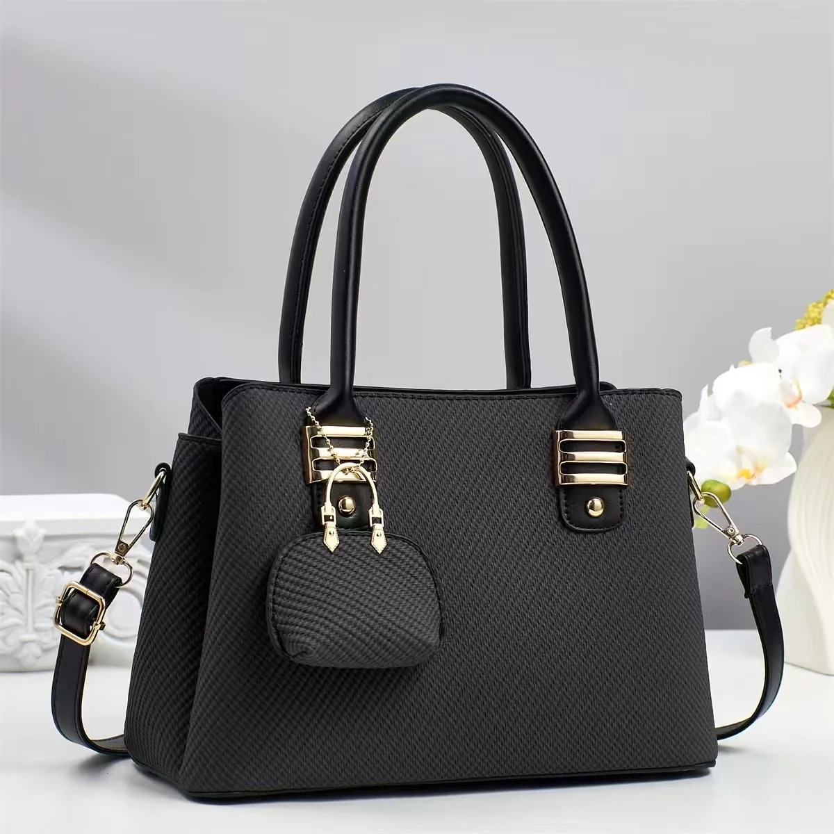 Sophisticated Quiet Luxury Tote with Signature Pendant - Versatile 3-Way Carry for Office & Weekend
Sophisticated Quiet Luxury Tote with Signature Pendant - Versatile 3-Way Carry for Office & Weekend