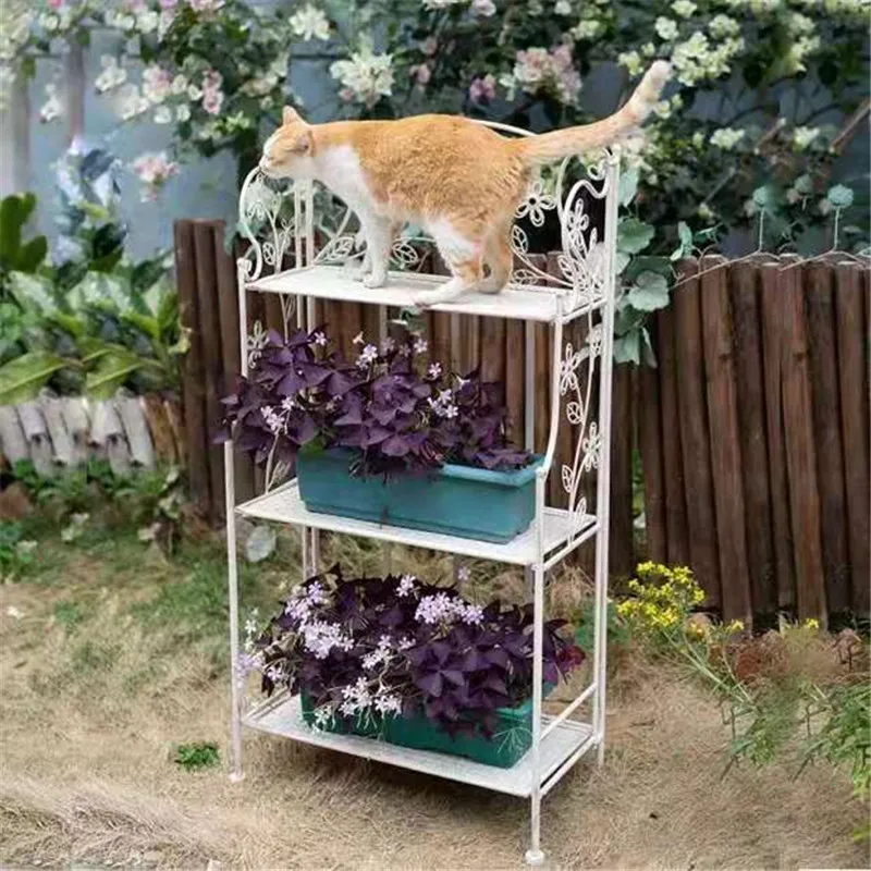 Wrought iron plant flower pot frame three or four layers raise the flower table simple flowers succulent green plants balcony
Wrought iron plant flower pot frame three or four layers raise the flower table simple flowers succulent green plants balcony