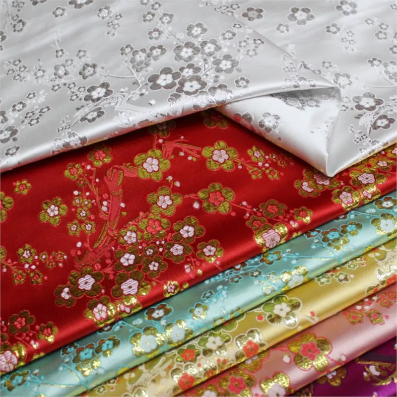 Chinese-style cheongsam and film television decorations handcrafted gold silver threads jacquard brocade plum blossom fabric
Chinese-style cheongsam and film television decorations handcrafted gold silver threads jacquard brocade plum blossom fabric