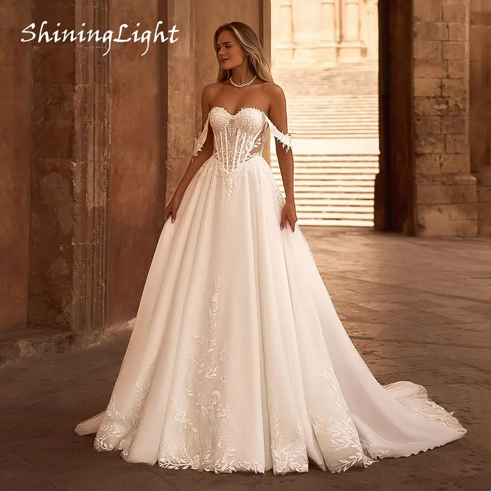 ShiningLight Sweetheart A-Line Wedding Dresses Off-Shoulder Sweep Train Appliques Boho Bridal Gown vestidos de noche Customized
ShiningLight Sweetheart A-Line Wedding Dresses Off-Shoulder Sweep Train Appliques Boho Bridal Gown vestidos de noche Customized