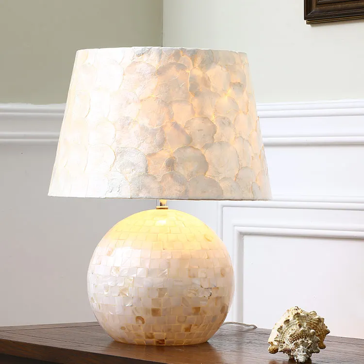 Light luxury American simple living room bedroom bedside hotel wedding model room homestay study natural shell desk lamp
Light luxury American simple living room bedroom bedside hotel wedding model room homestay study natural shell desk lamp
