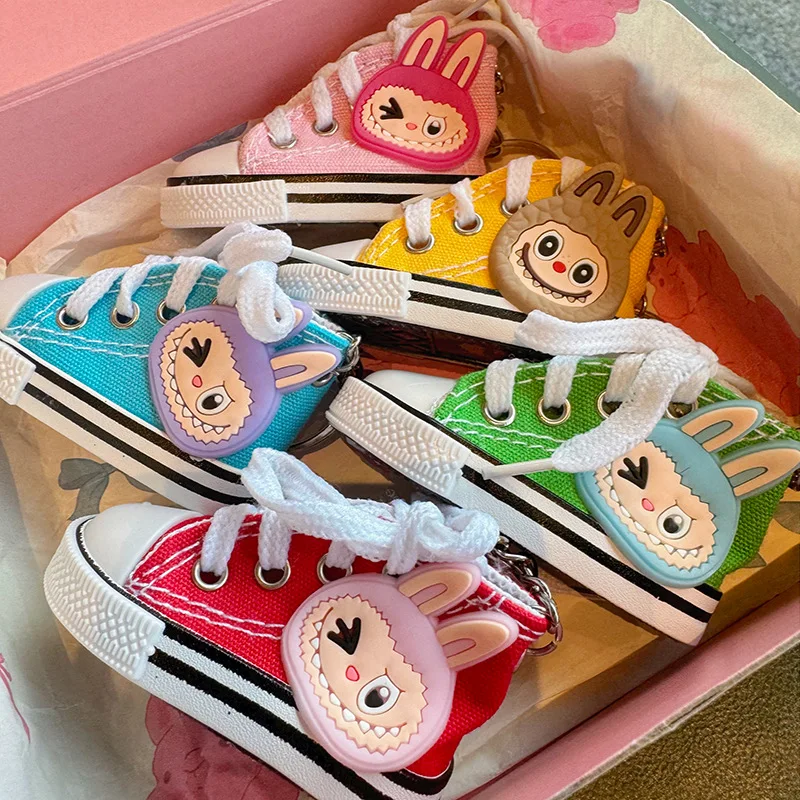 Mini Labubu Canvas Sneaker Keychain Cute Shoe Charm for Backpack Purse Handbag Trendy Unisex Accessories Gift for Teens Friends
Mini Labubu Canvas Sneaker Keychain Cute Shoe Charm for Backpack Purse Handbag Trendy Unisex Accessories Gift for Teens Friends