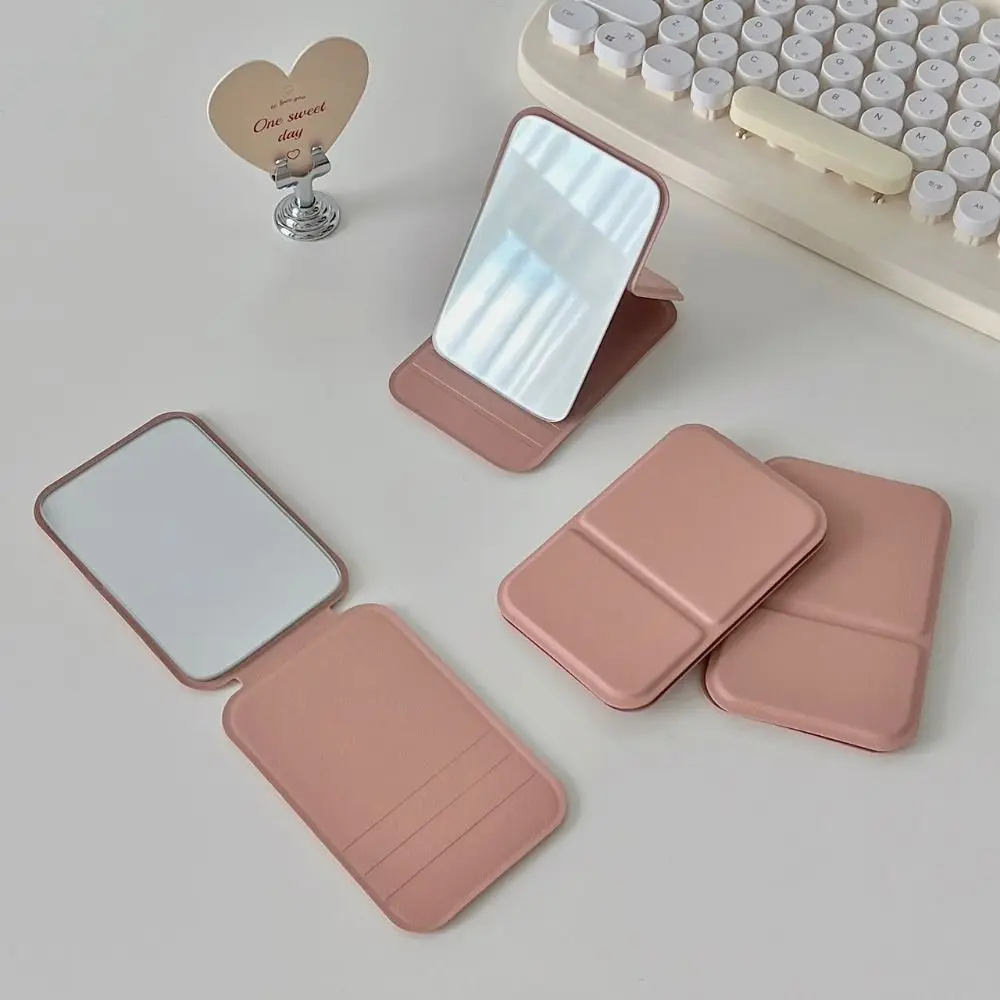 Desktop Makeup Mirror Solid Color PU Leather Simple Portable Handheld Makeup Mirror Foldable Student Compact Cute Pocket Mirror
Desktop Makeup Mirror Solid Color PU Leather Simple Portable Handheld Makeup Mirror Foldable Student Compact Cute Pocket Mirror