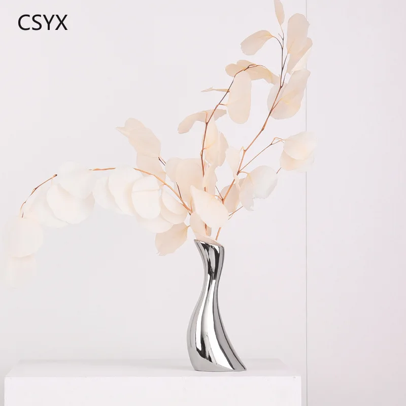 Ceramic vase electroplated silver simple dining table dried flowers flower arrangement cabinet ornament soft decoration jewelry
Ceramic vase electroplated silver simple dining table dried flowers flower arrangement cabinet ornament soft decoration jewelry