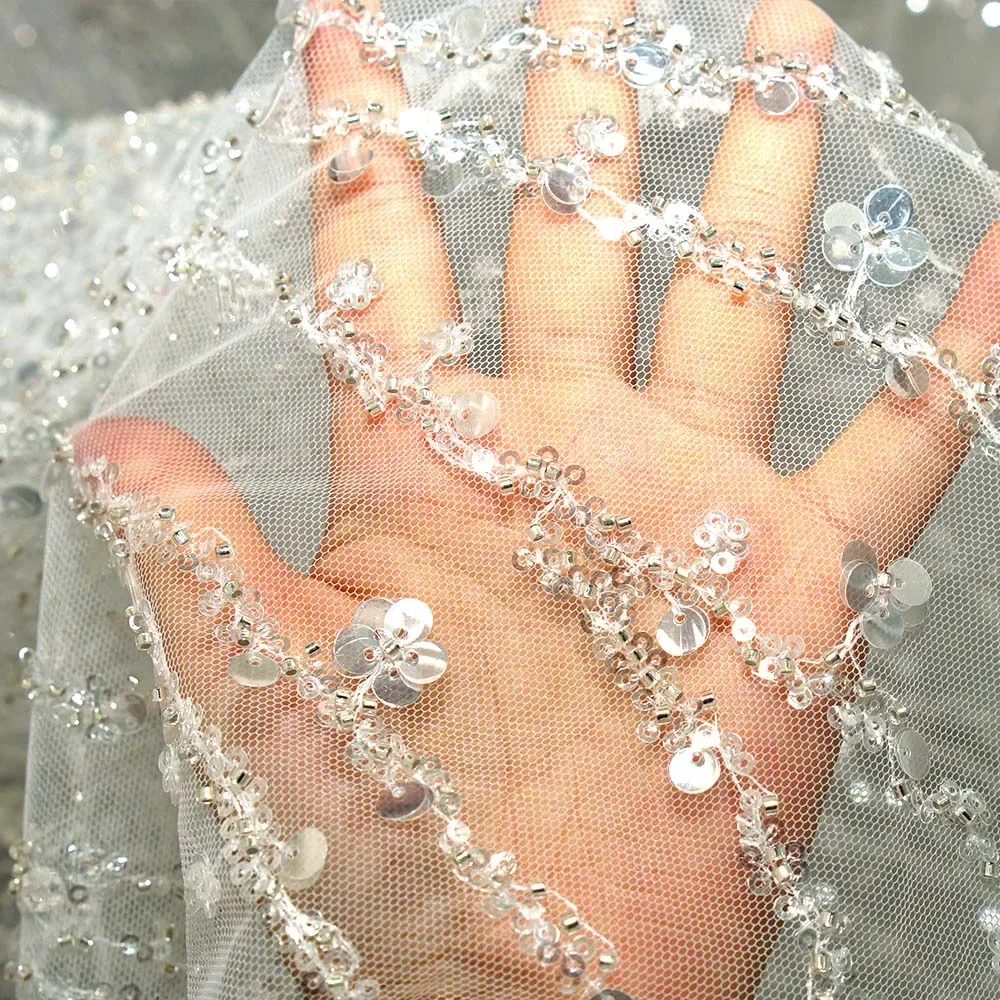 Silver Sequin Beaded Tulle Fabric Sparkle Embroidery Mesh For Evening Dress Bridal Veil Party Decor Luxury Textile Material
Silver Sequin Beaded Tulle Fabric Sparkle Embroidery Mesh For Evening Dress Bridal Veil Party Decor Luxury Textile Material
