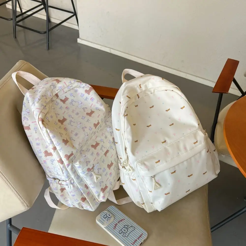 Подарочный нейлоновый рюкзак с милой собакой в корейском стиле, большая вместительная школьная сумка для студентов, сумка для хранения, дорожная сумка, сумка на плечо для студентов
Подарочный нейлоновый рюкзак с милой собакой в корейском стиле, большая вместительная школьная сумка для студентов, сумка для хранения, дорожная сумка, сумка на плечо для студентов