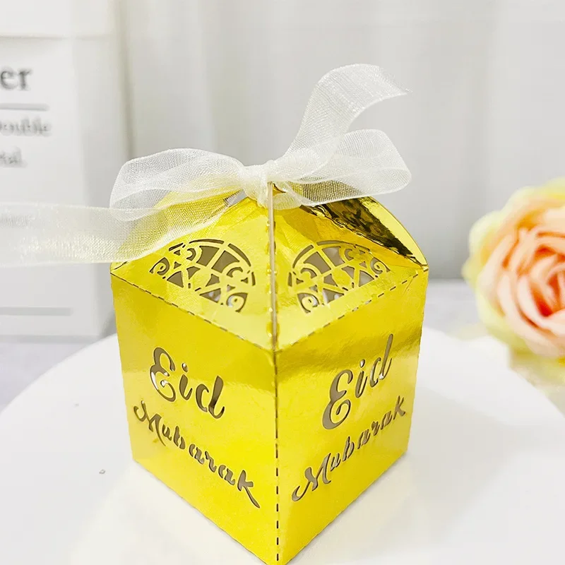 Laser Cut Hollow Muslim Eid Chocolate Candy Boxes Gold Packaging Boxes with Ribbons Wedding Party Favors Gift Wrapping Box
Laser Cut Hollow Muslim Eid Chocolate Candy Boxes Gold Packaging Boxes with Ribbons Wedding Party Favors Gift Wrapping Box