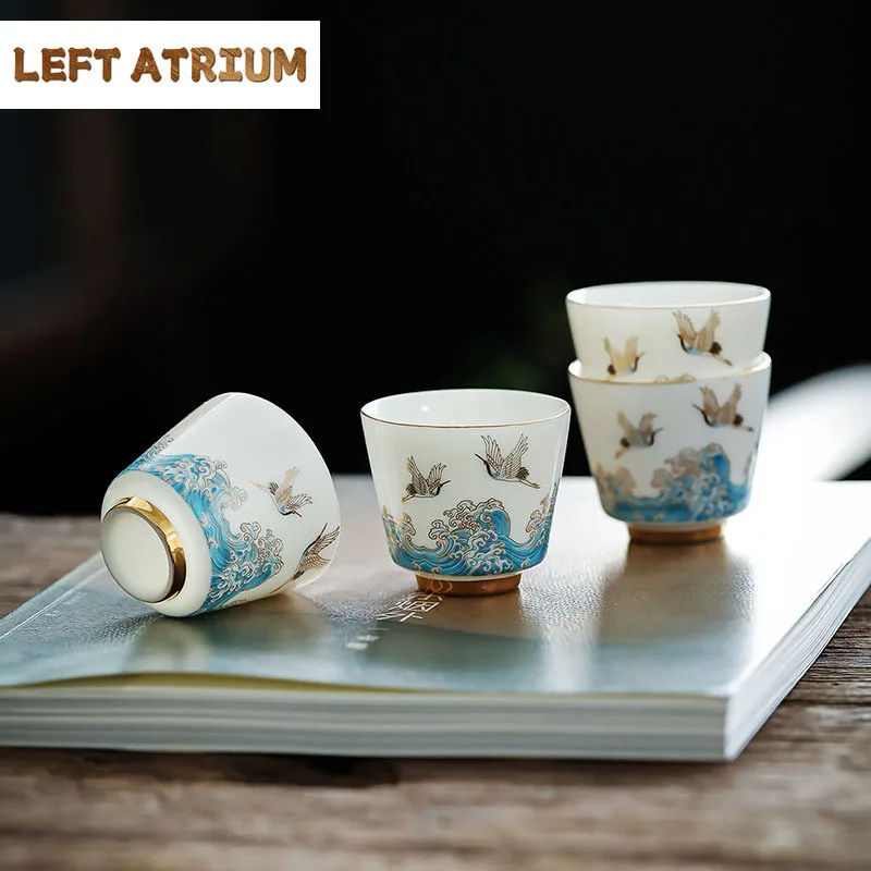 2pcs /Set 60ml Mutton Fat Jade White Porcelain Auspicious Crane Guanhai Tea Cup Creativity Gold-banded Ceramics Kung Fu Tea Set
2pcs /Set 60ml Mutton Fat Jade White Porcelain Auspicious Crane Guanhai Tea Cup Creativity Gold-banded Ceramics Kung Fu Tea Set