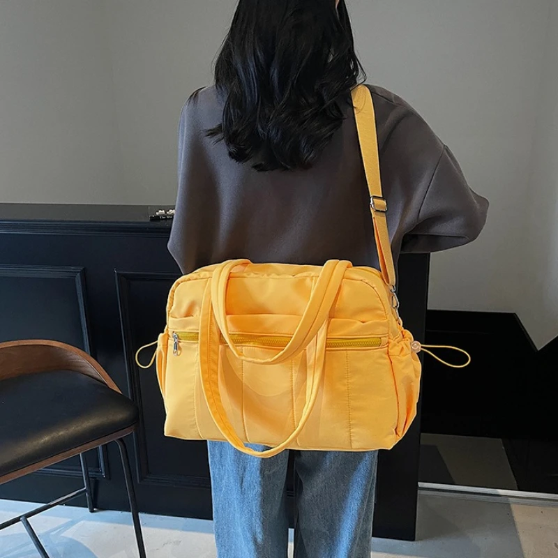 2026 New Women's Travel Bag Fashionable High Quality Large Capacity Luggage Bag Solid Color Multi Functional Moving Storage Bag
2026 New Women's Travel Bag Fashionable High Quality Large Capacity Luggage Bag Solid Color Multi Functional Moving Storage Bag