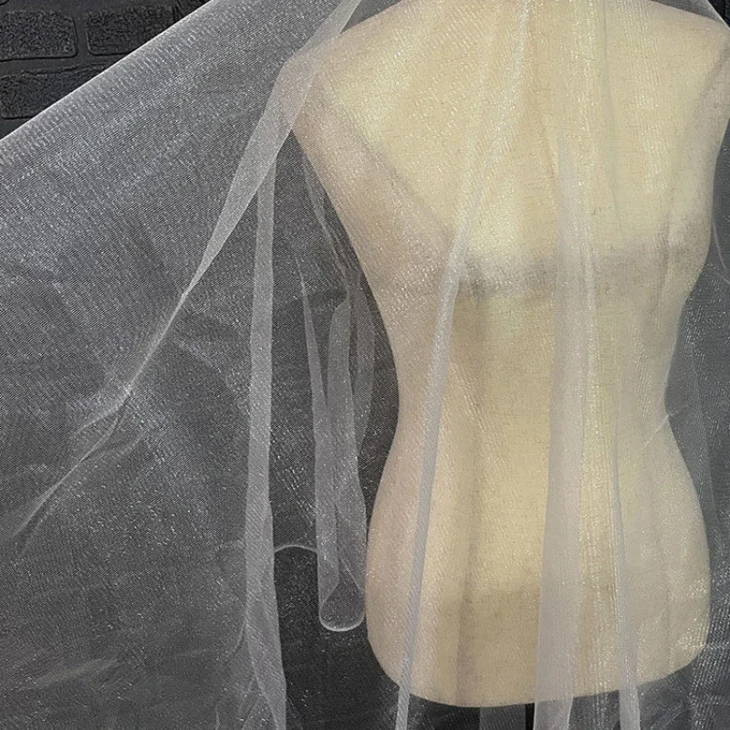 White Soft Mesh Fabric Solid Color Breathable Wedding Veil Dress Designer Fabric
White Soft Mesh Fabric Solid Color Breathable Wedding Veil Dress Designer Fabric