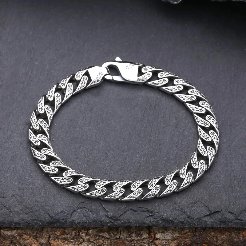 925 sterling silver bracelet tangcao pattern Cuban men's thick type Thai silver vintage distressed trendy unique ornament
925 sterling silver bracelet tangcao pattern Cuban men's thick type Thai silver vintage distressed trendy unique ornament