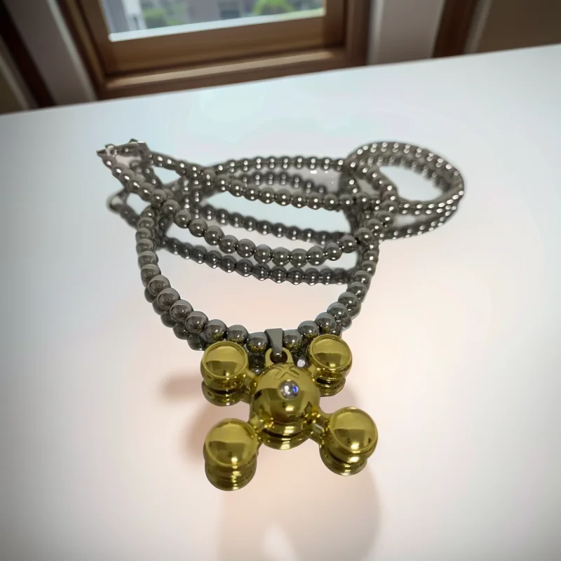 Stylish Stainless Steel Round Bead Necklace With a Hip Hop Gold Quadrilateral Pendant,a Perfect Jewelry Gift for Men and Women.
Stylish Stainless Steel Round Bead Necklace With a Hip Hop Gold Quadrilateral Pendant,a Perfect Jewelry Gift for Men and Women.