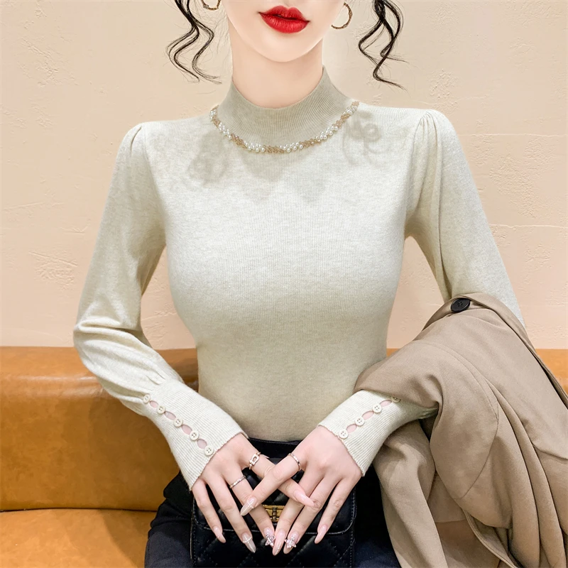 Французский облегающий вязаный свитер с высоким воротником для женщин, базовый слой, украшенный жемчугом, осенне-зимняя новинка
Французский облегающий вязаный свитер с высоким воротником для женщин, базовый слой, украшенный жемчугом, осенне-зимняя новинка