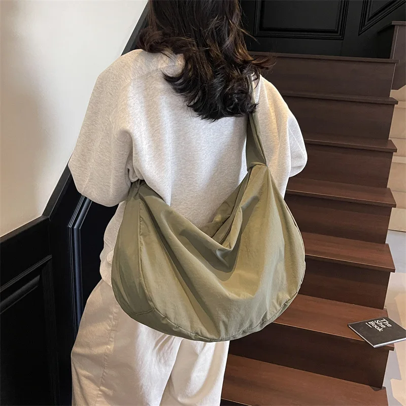 Fashion Canvas Student Crossbody Bag Japanese Simple Dumpling Solid Color Women's Shoulder Bag New Large-capacity Messenger Bag
Fashion Canvas Student Crossbody Bag Japanese Simple Dumpling Solid Color Women's Shoulder Bag New Large-capacity Messenger Bag