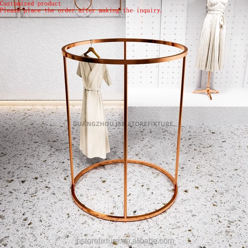 Retail Floor Display Stand Clothes Display Rack Rose Gold Dress Round Style Clothes Hanging Stand for Store Custom
Retail Floor Display Stand Clothes Display Rack Rose Gold Dress Round Style Clothes Hanging Stand for Store Custom