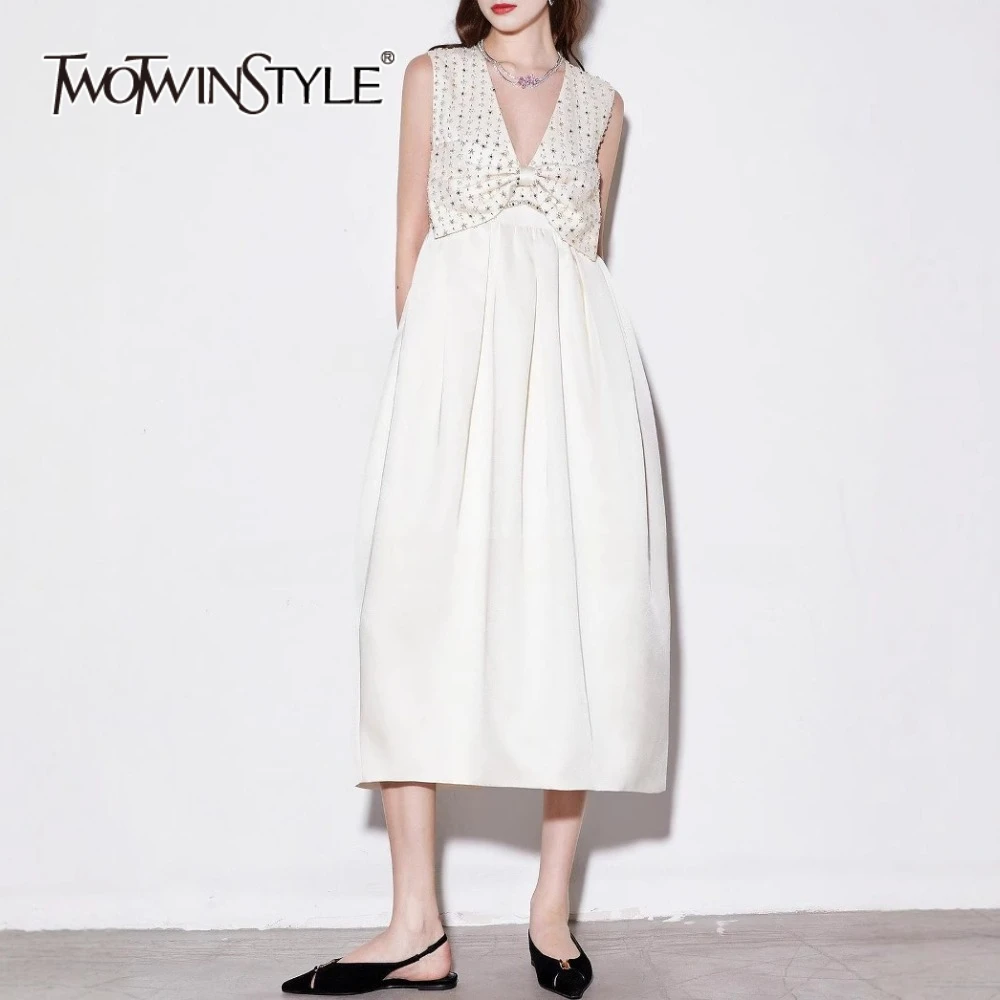 TWOTWINSTYLE Spliced Bowknot Sweet Dresses for Women V Neck Sleeveless High Waist Patchwork Embroidery Elegant Dress Female New
TWOTWINSTYLE Spliced Bowknot Sweet Dresses for Women V Neck Sleeveless High Waist Patchwork Embroidery Elegant Dress Female New