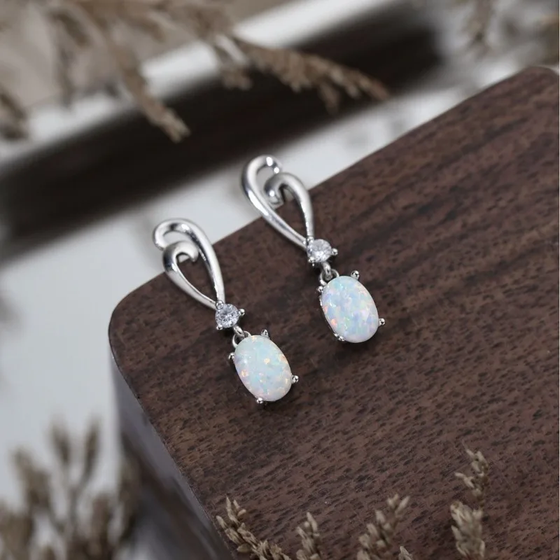 New Simple Style Opal Stud Earrings S925 Silver Retro Temperament Ear Hanging Women
New Simple Style Opal Stud Earrings S925 Silver Retro Temperament Ear Hanging Women