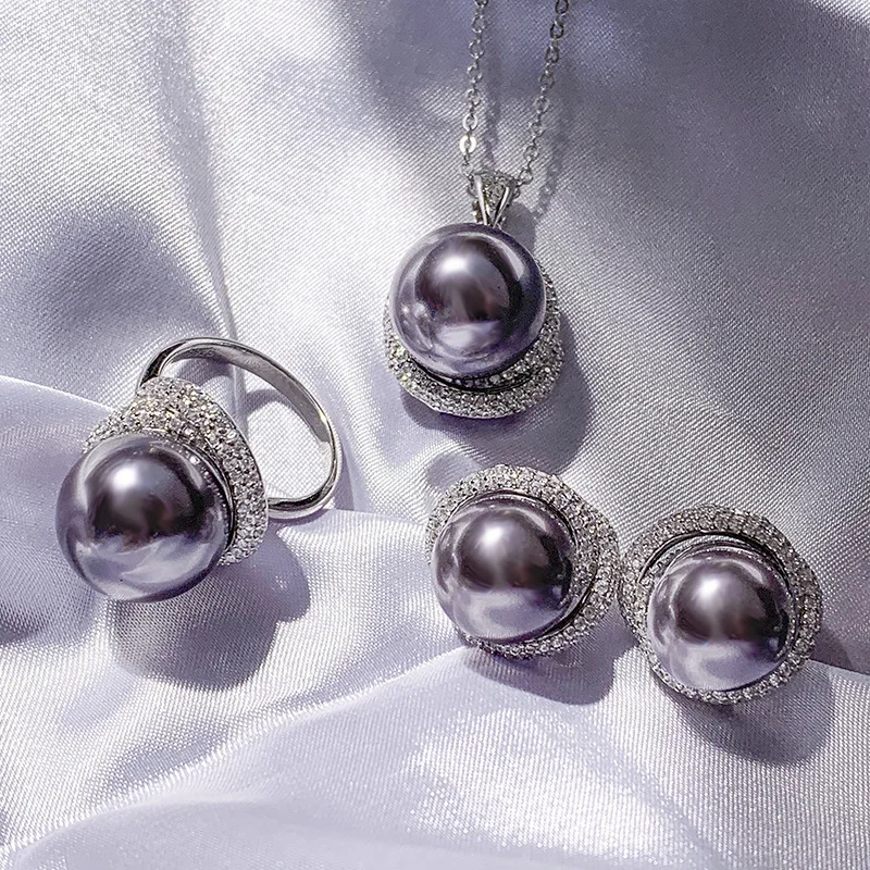 Jewelry S925 Silver Inlaid Obey Women's Gray Pearl Versatile Pendant Set 14mm 12mm
Jewelry S925 Silver Inlaid Obey Women's Gray Pearl Versatile Pendant Set 14mm 12mm