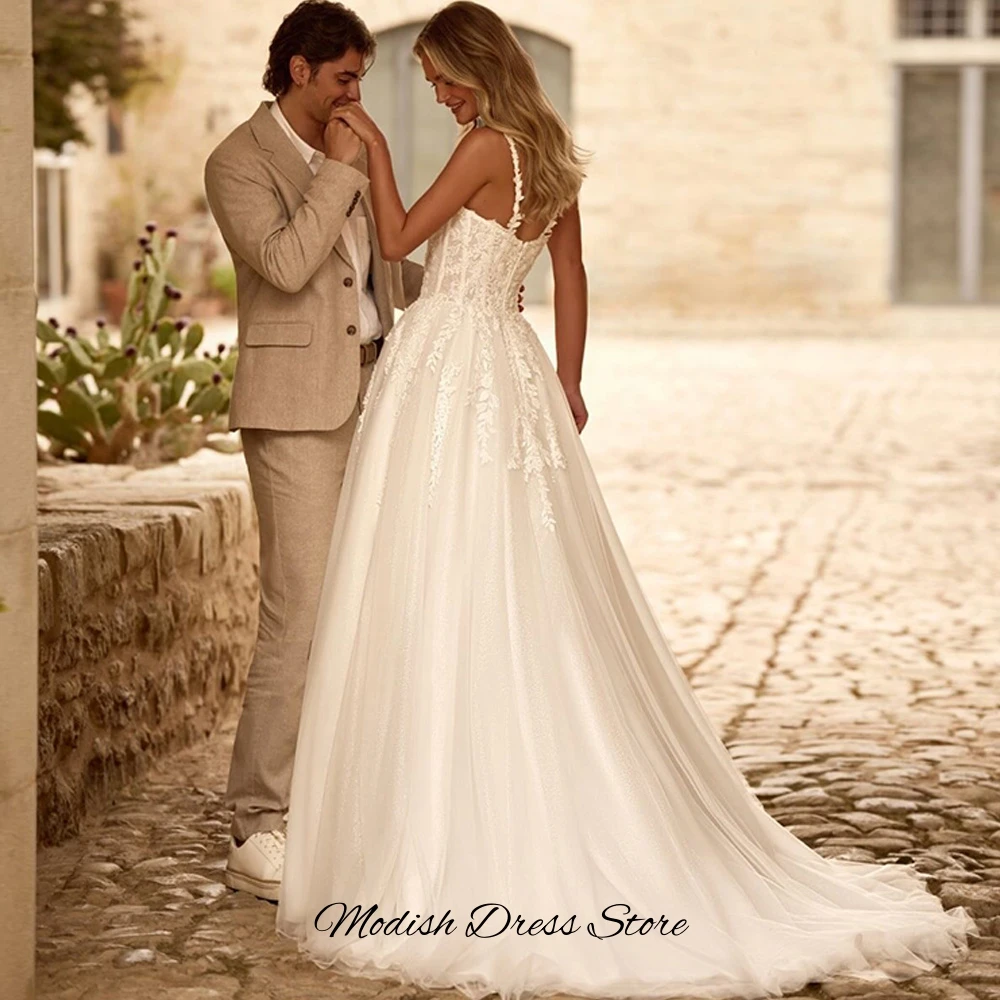 Side Slit A-Line Customized Bridal Gown Luxury Appliques Spaghetti Straps Wedding Dress Charming Tulle Sleeveless Robe de mariée
Side Slit A-Line Customized Bridal Gown Luxury Appliques Spaghetti Straps Wedding Dress Charming Tulle Sleeveless Robe de mariée