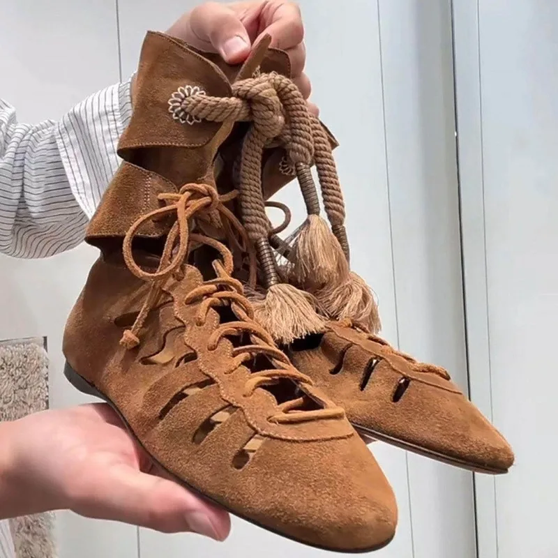 2026 New Bohemian Tassel Cross Lace Up Design Cool Boots Fashion Hollow Solid Color Breathable Comfort Casual Flat Women Shoes
2026 New Bohemian Tassel Cross Lace Up Design Cool Boots Fashion Hollow Solid Color Breathable Comfort Casual Flat Women Shoes