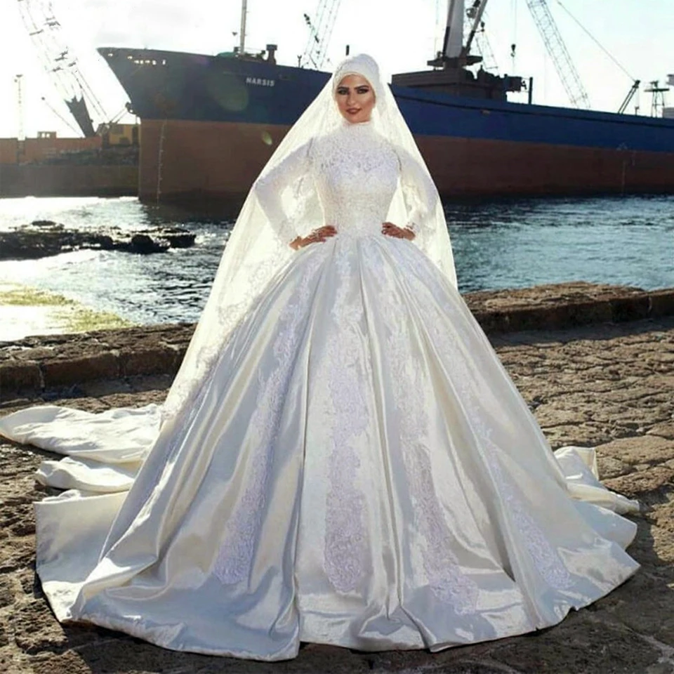 Элегантное мусульманское бальное платье цвета слоновой кости с высоким воротом и длинными рукавами, свадебные платья 2025 года, атласные аппликации, арабские платья невесты, Vestidos De Novia
Элегантное мусульманское бальное платье цвета слоновой кости с высоким воротом и длинными рукавами, свадебные платья 2025 года, атласные аппликации, арабские платья невесты, Vestidos De Novia