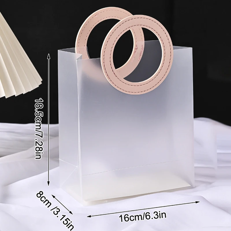 5 PCS Transparent Frosted Tote Bag PVC Waterproof Companion Gift Candy Bag Holiday Gift Bag Christmas Party Gift Bag
5 PCS Transparent Frosted Tote Bag PVC Waterproof Companion Gift Candy Bag Holiday Gift Bag Christmas Party Gift Bag