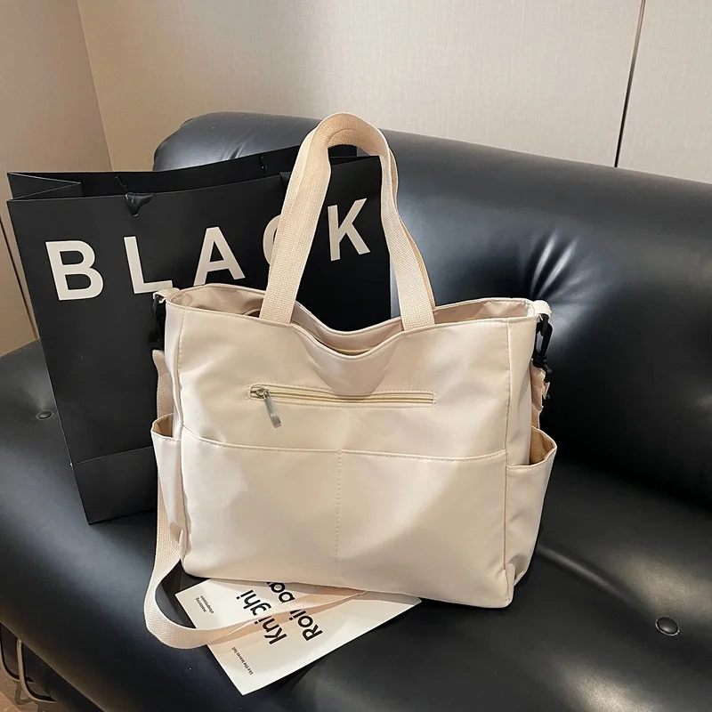 Large-capacity Multi-pocket Casual Mommy Tote Cloth Shoulder Bag for Women 2026 New Summer Solid Color Texture Crossbody Bag
Large-capacity Multi-pocket Casual Mommy Tote Cloth Shoulder Bag for Women 2026 New Summer Solid Color Texture Crossbody Bag