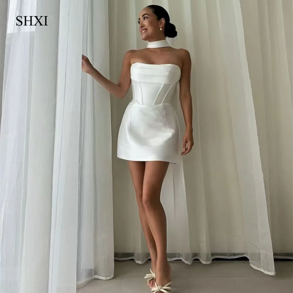 SHXI Fashionable strapless short wedding dress sleeveless fish bone satin bridal dress custom backless Saudi wedding party dress
SHXI Fashionable strapless short wedding dress sleeveless fish bone satin bridal dress custom backless Saudi wedding party dress