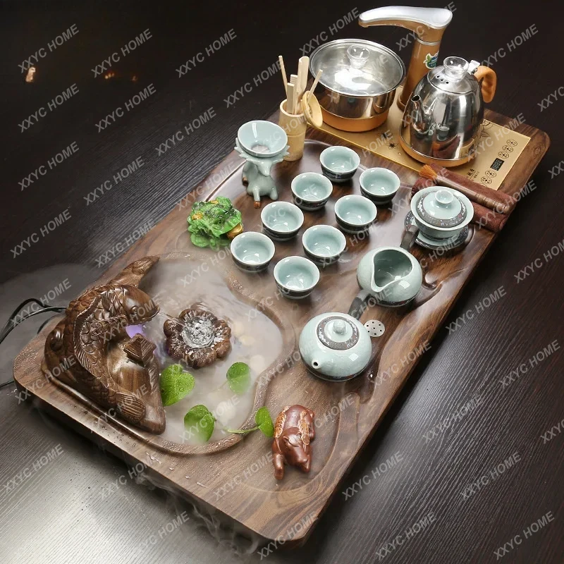 A Chinese ceramic purple sand Kung Fu tea set, home office fully automatic integrated tea tray
A Chinese ceramic purple sand Kung Fu tea set, home office fully automatic integrated tea tray
