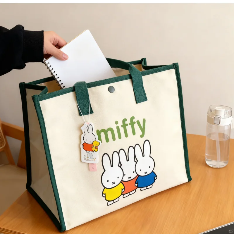 Miffy новая большая вместительная сумка-тоут Kawaii с мультяшным принтом, разноцветная парусиновая ручная сумка на одно плечо, дорожная сумка для мамы
Miffy новая большая вместительная сумка-тоут Kawaii с мультяшным принтом, разноцветная парусиновая ручная сумка на одно плечо, дорожная сумка для мамы
