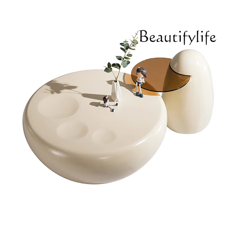 Cream style living room small apartment high-end cat claw coffee table round modern simple household light luxury 
Cream style living room small apartment high-end cat claw coffee table round modern simple household light luxury