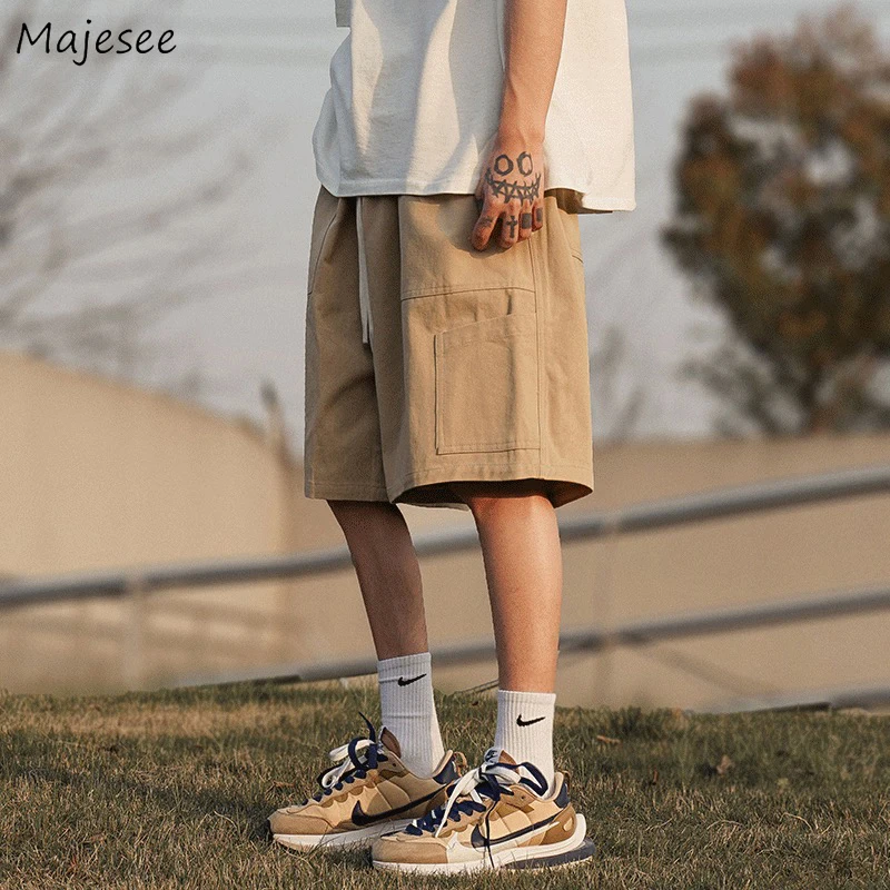 Летние мужские шорты-карго Простые свободные повседневные бегуны с несколькими карманами Уличная одежда Красивые универсальные корейские модные шорты Мужские
Летние мужские шорты-карго Простые свободные повседневные бегуны с несколькими карманами Уличная одежда Красивые универсальные корейские модные шорты Мужские