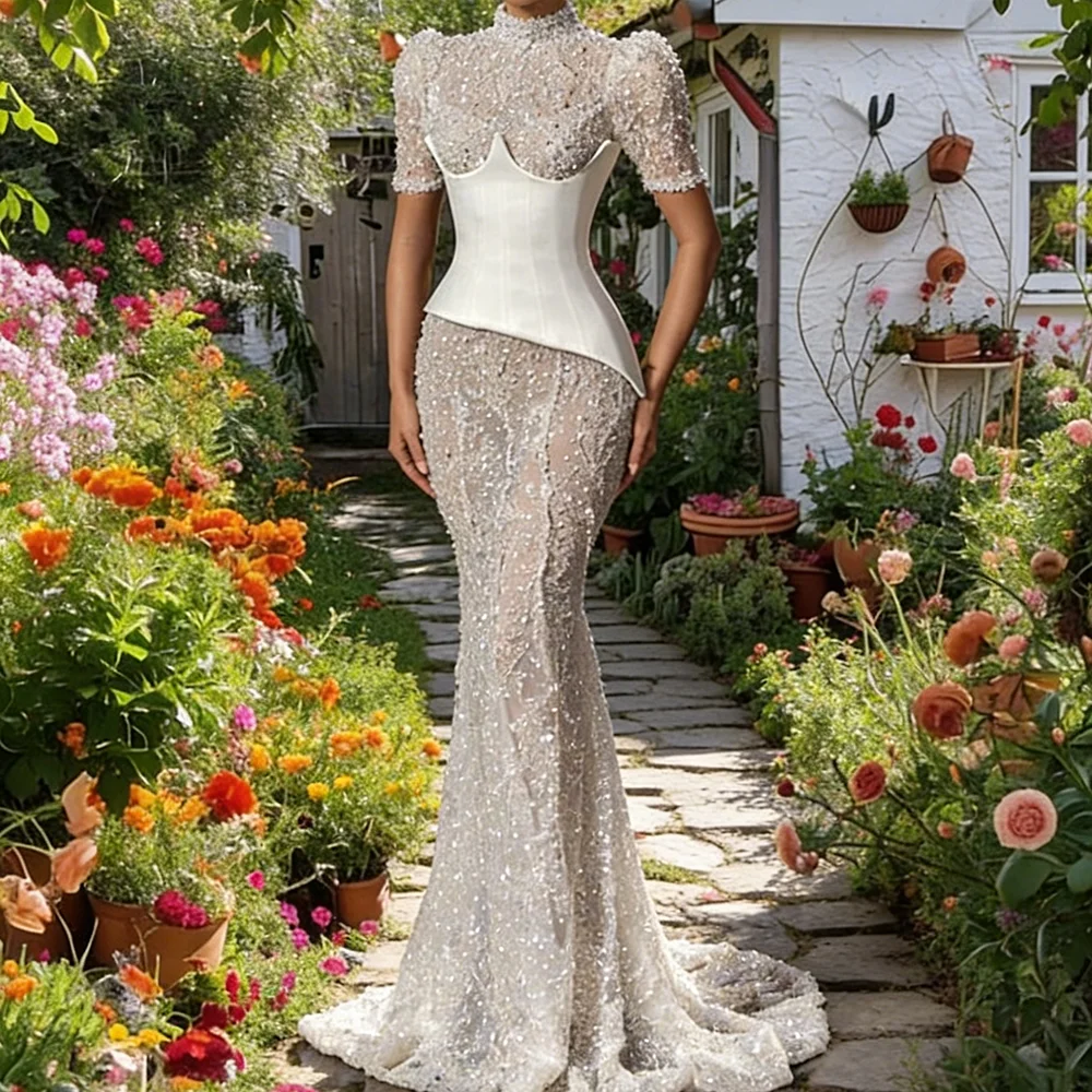 Изысканные свадебные платья с высоким воротником, короткими рукавами, украшенные бисером, в стиле русалка, на заказ.
Изысканные свадебные платья с высоким воротником, короткими рукавами, украшенные бисером, в стиле русалка, на заказ.