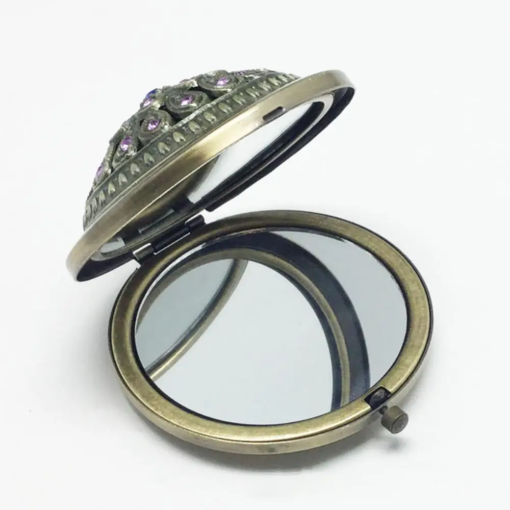 Vintage Exquisite Hollow Flower Mirror Mini Folding Pocket Round Double-sided Makeup Mirror Portable Elegant Cosmetic Mirror
Vintage Exquisite Hollow Flower Mirror Mini Folding Pocket Round Double-sided Makeup Mirror Portable Elegant Cosmetic Mirror