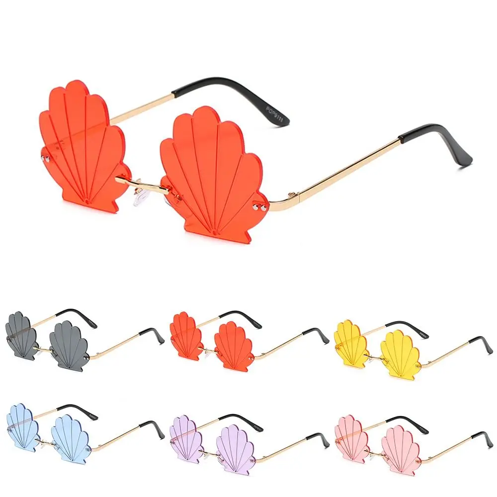 Shell Shape Rimless Sunglasses For Women Men Metal Sun Glasses Flower Shape Ocean Lens Shades Unique Funny Shades Eyewear
Shell Shape Rimless Sunglasses For Women Men Metal Sun Glasses Flower Shape Ocean Lens Shades Unique Funny Shades Eyewear