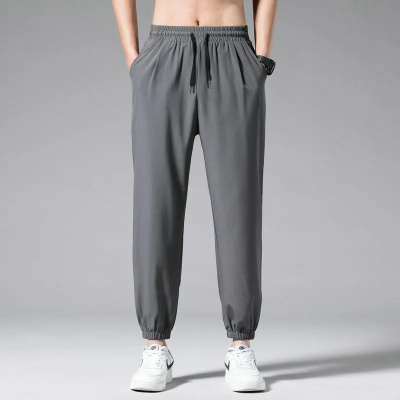 Trend New Summer Solid Men's Wear Elastic Wait Drawstring Pockets Ice Silk Fabric Casual Loose Bound Feet Ankle Length Pants
Trend New Summer Solid Men's Wear Elastic Wait Drawstring Pockets Ice Silk Fabric Casual Loose Bound Feet Ankle Length Pants